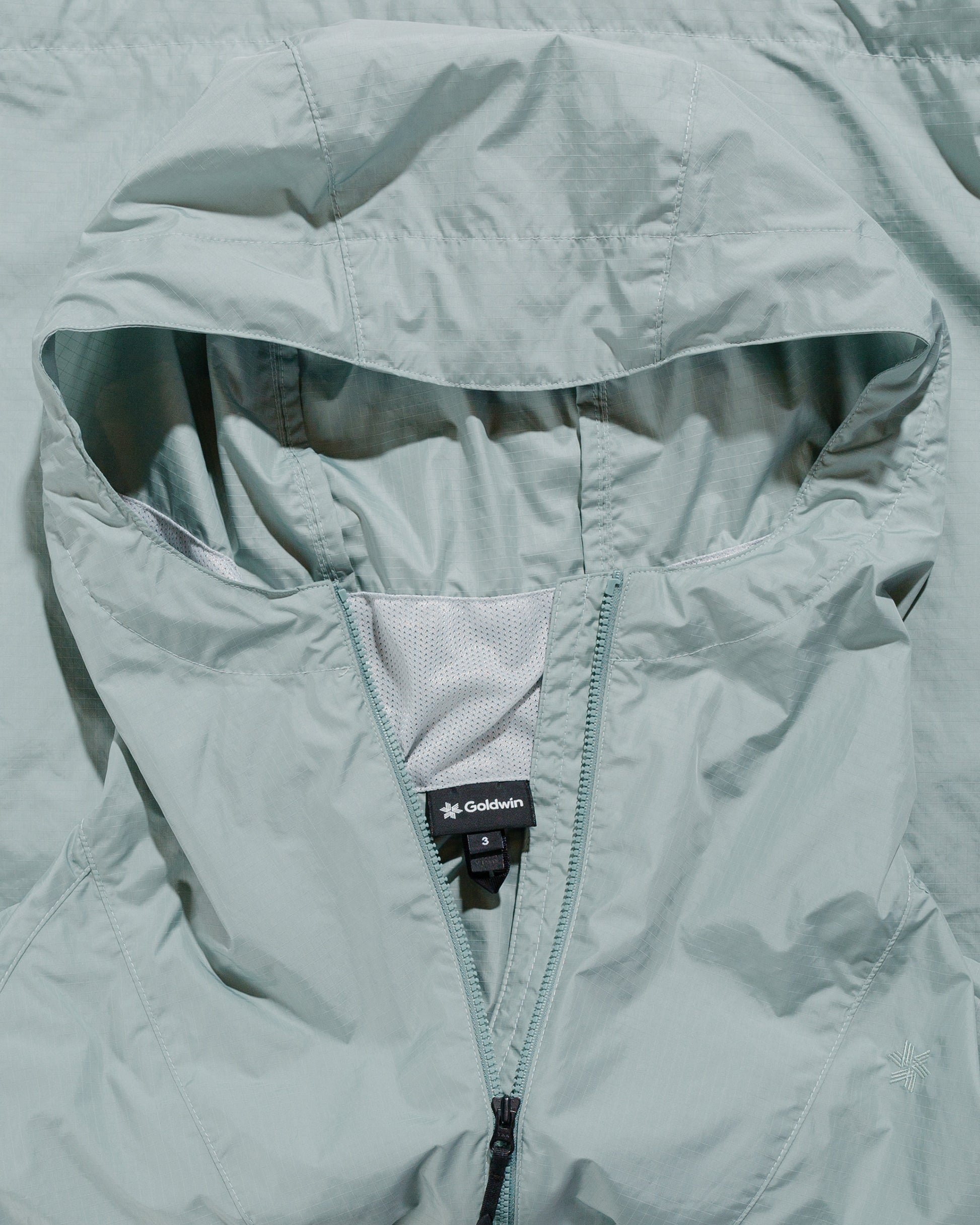 lost & found Goldwin Goldwin Rip-stop Hooded Jacket Mist Green