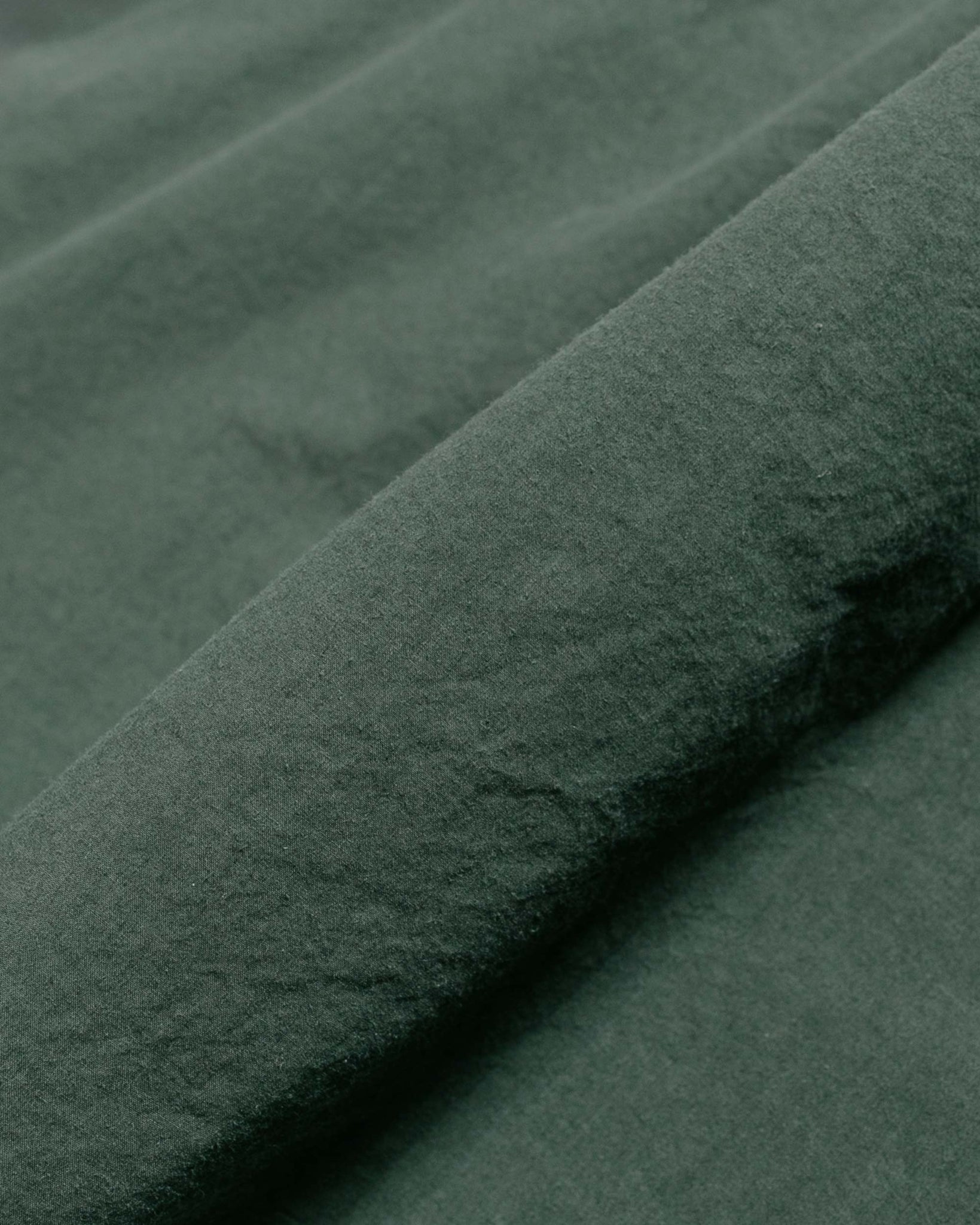 Norse Projects Carsten Tencel Spruce Green fabric